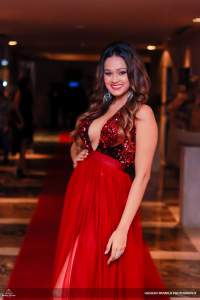 Anjali Vinodya Flashes In Red Dress