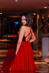 Anjali Vinodya Flashes In Red Dress