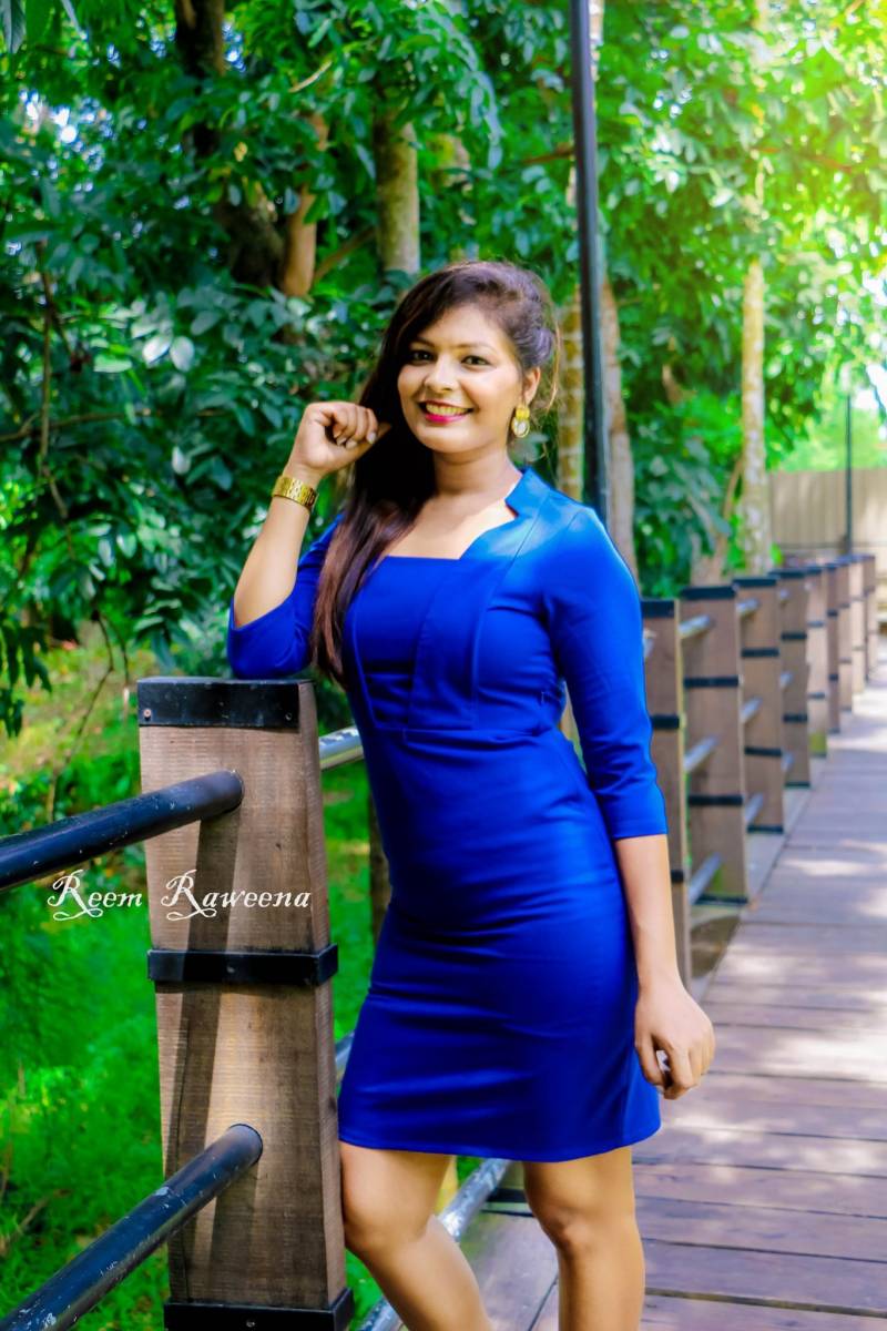 Reem Raweena In Blue Dress